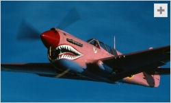 Sue Parish flying her pink P-40